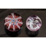 Two Scottish Paperweights, a Caithness pale pink swirl, and a Strathern multi-coloured paperweight.