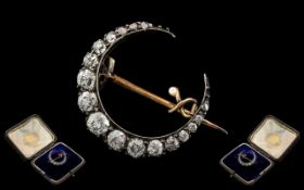 Antique Period - Attractive 15ct Gold Diamond Set Crescent Brooch of Small Proportions.