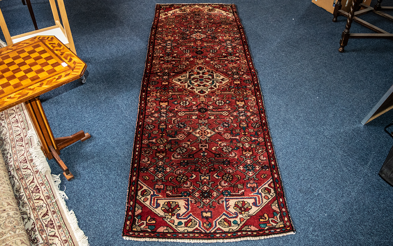 Washed Red Ground Persian Hamadam Runner, measures 272 x .85.