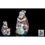 Lladro - Hand Painted Porcelain Figure ' A Gift From Santa ' Model No 6575. Sculpture Juan Huerta.