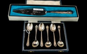 A Set of Six Silver Spoons with cross golf club terminals. Hallmarked for Dublin.