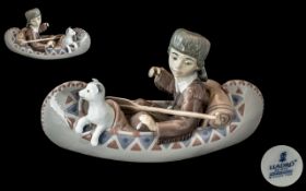 A Lladro Figure #6640 'Little Explorer' Paddle is loose but in-tact.