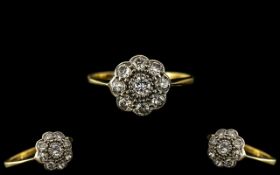 Antique Period 18ct Gold and Platinum Diamond Set Cluster Ring of petite proportions,