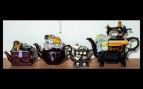 Collection of Four Novelty Teapots, comprising Cardew 'Rise & Shoeshine',