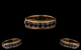 14ct Gold - Attractive Seven Stone Sapphire Set Ring. Marked 14ct to Interior of Shank. The Seven