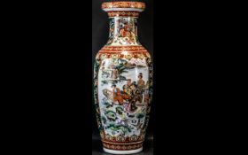 Large Oriental Style Temple Vase, depicting figures at the riverside. Measures 23" tall.