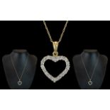 9ct Gold Heart Shaped Diamond Set Pendant with Attached 9ct Gold Chain. Chain and Pendant Marked for