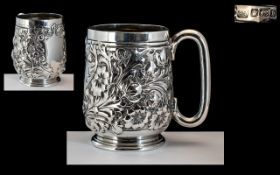 Late Victorian - Sterling Silver Cup with Embossed Floral Decoration with Vacant Cartouche and