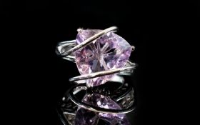 Amethyst 'Caged' Solitaire Statement Ring, a 10ct trillion cut amethyst set in an openwork gallery