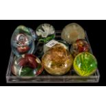 A Collection of Nine Paperweights made in China.
