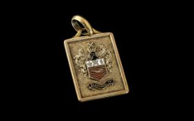 A 9ct Gold Blackpool Football Club Enamel Pendant height including bale - 35 mm x 20 mm. 8 grams.