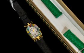 A Ladies Murano Wristwatch with Millefiori bezel and changeable green leather italian strap.