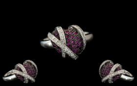 18ct White Gold - Contemporary Designed Ruby and Diamond Set Dress Ring.