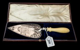 A Victorian Silver Presentation Trowel fully hallmarked for Sheffiled O 1881 with turned handle in