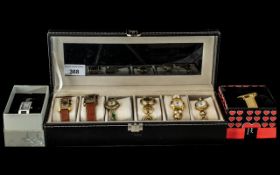 Collection of Eight Fashion Watches, comprising two Solvil & Titus watches with tan leather straps,