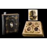 Victorian Musical Family Album, in tooled album cover with cartouche and brass fittings,