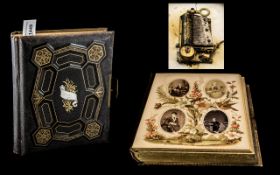 Victorian Musical Family Album, in tooled album cover with cartouche and brass fittings,