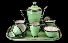 Art Deco Porcelain Tea Service, green ground with applied silver to edges, spout and lid.