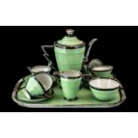 Art Deco Porcelain Tea Service, green ground with applied silver to edges, spout and lid.