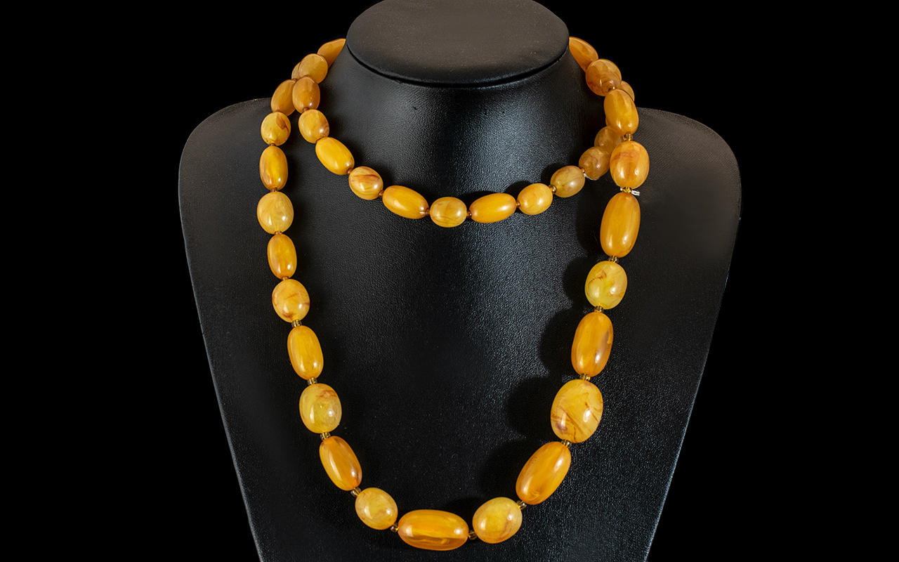Graduated Amber Coloured Bead Necklace.