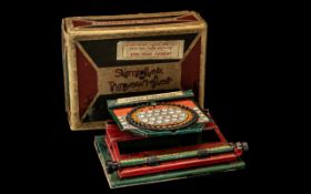 Simplex Tin Plate Toy Typewriter, in original box, made in the USA.