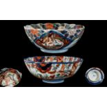 Chinese Late 19th Century Pair of Pleasing Hand Painted Imari Pattern Footed Bowls with scalloped