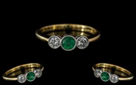 18ct Gold - Superb Quality 3 Stone Diamond and Emerald Set Dress Ring. Rub-over Setting. The