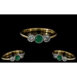 18ct Gold - Superb Quality 3 Stone Diamond and Emerald Set Dress Ring. Rub-over Setting. The