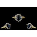 18ct Gold Attractive Sapphire and Diamond Set Cluster Ring, hallmarked to interior of shank,