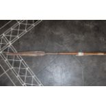 An African Wood Shafted Spear together with one other without the shaft.