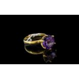 Amethyst Round Cut Solitaire Ring, a rou