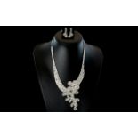 Asymmetric 'Flower and Leaves' White Crystal Necklace and Matching Drop Earrings, the necklace