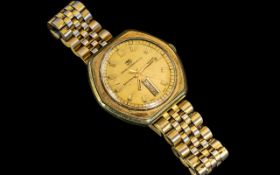 Watches of Switzerland - Vintage Seafarer Automatic Date / Day Gold on Stainless Steel Gents Wrist