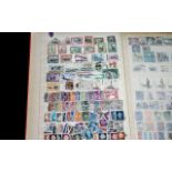 Well filled A4 stamp stock book - with huge variety of old stamps from around the world.