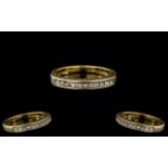 Ladies 18ct Gold Attractive Diamond Set Half-Eternity Ring. Full Hallmark for 750 - 18ct to Interior