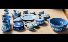 Collection of Wedgwood Blue Jasper Ware, including two vases, a large bowl, jug, trinket boxes,