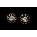 A Fine Pair of Diamond Set Stud Earrings In 18ct Gold, Flower head Design. Marked 750. The Round