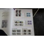 Two stock books of Irish commemorative stamps, mostly in unmounted mint blocks of four (Just a few