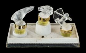 Lalique Pour Homme Flacons Collection After Shave Trio, in original Lalique box.