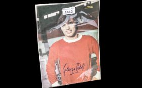 George Best Autograph on Manchester United Picture Removed From Football Annual.