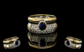 18ct Gold Bespoke Diamond and Sapphire Set Designer Ring, the cabochon cut sapphire of excellent