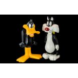 Warner Brothers Studio Store Daffy Figurine 13 inches in height.