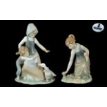 Two Lladro Figurines 'Girl Gathering Flowers' (#1172) 8 inches tall and 'Avoiding the Goose'