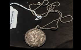 1887 Queen Victoria Florin mounted and suspended on a 22" chain.
