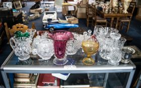 Quantity of Glass Items, including jugs, vases, bowls, tankards, lidded pots, cranberry glass,