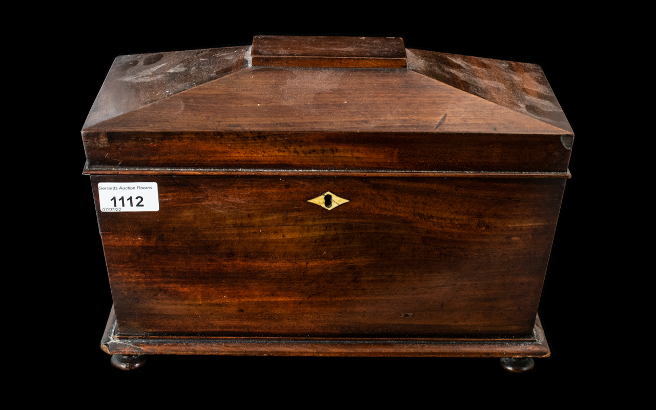 A Victorian Mahogany Tea Caddy fitted interior with two lidded compartments and later glass mixing