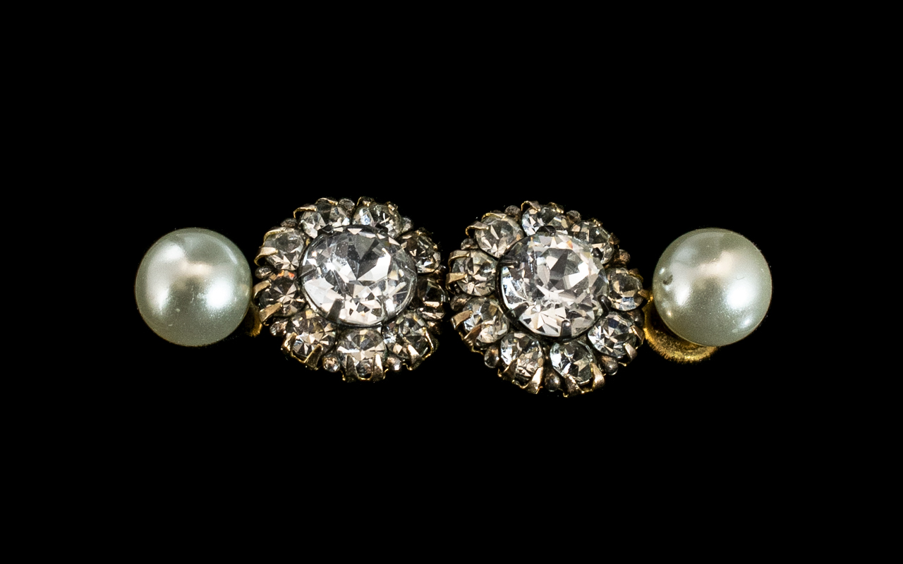 A Pair of 9ct Gold Antique Earrings set with clear paste. Diameter 12 mm. Together with a pair of