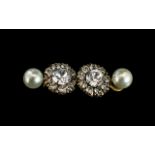 A Pair of 9ct Gold Antique Earrings set with clear paste. Diameter 12 mm. Together with a pair of