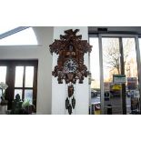A Large Kaiser Musical Cuckoo Clock of typical design and form. Overall height 44 inches.