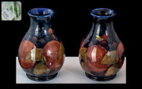 William Moorcroft Signed Matched Pair of Small Global Shaped Vases From the 1930's.